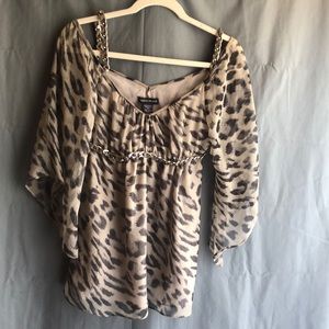 100%polyester exclusive of trims print top